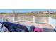 Inviting outdoor deck with lounge chairs, perfect for enjoying the neighborhood views at 10259 Fairgate Way, Highlands Ranch, CO 80126
