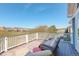 Relaxing deck featuring patio furniture and views of the neighborhood at 10259 Fairgate Way, Highlands Ranch, CO 80126
