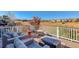 Outdoor deck with seating area to enjoy surrounding views at 10259 Fairgate Way, Highlands Ranch, CO 80126