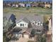 Two-story home showing a three-car garage and beautiful exterior and landscaping at 10259 Fairgate Way, Highlands Ranch, CO 80126
