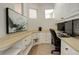 Dedicated office with ample counter space, storage, and great natural light at 10259 Fairgate Way, Highlands Ranch, CO 80126