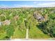 Aerial view of a community park with walking paths and open green spaces at 1052 Northampton Ct, Highlands Ranch, CO 80126