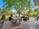 Enjoy the outdoor space complete with a dining set, grill and lounge seating at 1052 Northampton Ct, Highlands Ranch, CO 80126