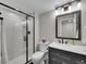 Updated bathroom with modern shower and vanity at 1052 Northampton Ct, Highlands Ranch, CO 80126