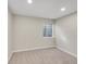 The bedroom with simple decor has carpet floor at 1052 Northampton Ct, Highlands Ranch, CO 80126