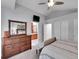 Bright and airy bedroom with a view of the ensuite bathroom and walk-in closet at 1052 Northampton Ct, Highlands Ranch, CO 80126