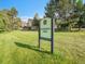 Diamond K Park sign with lush green surroundings in a well-maintained park at 1052 Northampton Ct, Highlands Ranch, CO 80126