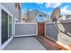 This fenced patio space provides an intimate outdoor experience at 7707 S Monaco Cir, Centennial, CO 80112