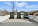 Outdoor roof deck featuring a hammock, privacy trellis planters, and clear blue sky at 428 Pontiac St, Denver, CO 80220