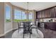 Bright eat in dining area showcases a large picture window with a golf course view at 27625 E Moraine Dr, Aurora, CO 80016