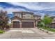Beautiful two-story home featuring a large three-car garage, landscaped yard, and a traditional design at 27625 E Moraine Dr, Aurora, CO 80016