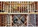 Climate-controlled wine cellar featuring custom racking for organized storage of numerous bottles at 27625 E Moraine Dr, Aurora, CO 80016