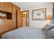 A serene bedroom offers a large built-in closet and a wall decoration to bring character to your living space at 9942 Lane St, Thornton, CO 80260
