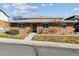 Charming brick home with a well-maintained lawn and inviting entrance at 9942 Lane St, Thornton, CO 80260