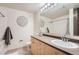 Simple bathroom with modern fixtures, neutral finishes, and a clean, functional layout at 5677 S Park Pl # D310, Greenwood Village, CO 80111