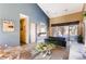 Well-lit community lobby with comfortable seating, plants, and neutral walls for a cozy and welcoming atmosphere at 5677 S Park Pl # D310, Greenwood Village, CO 80111