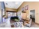 A spacious lobby with comfortable seating, decorative plants, and ample natural light from the front entryway at 5677 S Park Pl # D310, Greenwood Village, CO 80111