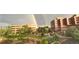 A rainbow view from the building's large windows with green spaces and building at 5677 S Park Pl # D310, Greenwood Village, CO 80111