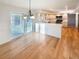Eat in kitchen featuring a large sliding glass door, marble countertops, and stainless steel appliances at 1703 S Moline Ct, Aurora, CO 80012