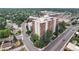 Aerial view of the apartment building close to retail businesses, roads, and residential neighborhoods at 4570 E Yale Ave # 1104, Denver, CO 80222