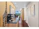 Hallway featuring a wine rack and views of the mountains through the window at 4570 E Yale Ave # 1104, Denver, CO 80222