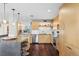 Modern kitchen with sleek countertops, stainless steel appliances, and a breakfast bar at 4570 E Yale Ave # 1104, Denver, CO 80222