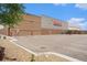 Exterior view of a large commercial building with ample parking, suggesting retail or industrial use at 4760 Kittredge St, Denver, CO 80239