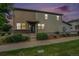 Charming two-story home with well-maintained lawn and inviting front entrance, showcasing modern design at 4760 Kittredge St, Denver, CO 80239