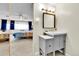 Bathroom with a modern vanity and a view of the bedroom at 710 S Alton Way # 5A, Denver, CO 80247