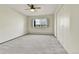 Bright bedroom with a large window and closet, offering ample natural light and storage at 710 S Alton Way # 5A, Denver, CO 80247