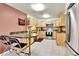 Eat-in kitchen featuring stainless steel appliances, updated countertops, and modern cabinets at 710 S Alton Way # 5A, Denver, CO 80247
