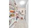Walk-in pantry with ample shelving for organized storage and a convenient small counter at 710 S Alton Way # 5A, Denver, CO 80247