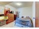 Cozy bedroom featuring neutral tones, ample storage, and a comfortable space for relaxation at 1256 Ulster St, Denver, CO 80220