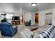 Inviting living room featuring plush seating, cozy lighting, and neutral-toned decor for comfortable living at 1256 Ulster St, Denver, CO 80220