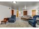 Comfortable living room offers plush seating, natural light, and a serene atmosphere for leisure and relaxation at 1256 Ulster St, Denver, CO 80220