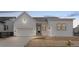 Charming single-Gathering home with a 2-car garage and modern farmhouse-style facade at 11442 Autumn Moon St, Littleton, CO 80125
