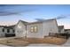 Street view of a lovely single-Gathering home with a well-manicured yard and farmhouse details at 11442 Autumn Moon St, Littleton, CO 80125