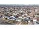 Aerial view of a neighborhood with cozy homes, showcasing the community and its residential appeal at 1345 S Meade St, Denver, CO 80219