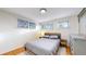 Bedroom featuring wood floors and neutral paint at 1345 S Meade St, Denver, CO 80219