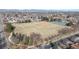 Aerial shot of a large park with sports fields, showcasing open spaces and recreational amenities at 1345 S Meade St, Denver, CO 80219