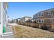 Backyard with green space and a wooden fence at 12264 Olive Way, Thornton, CO 80602