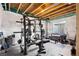 Basement area set up as a home gym with weights and exercise equipment at 12264 Olive Way, Thornton, CO 80602
