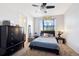 Cozy bedroom offering a dresser and closet space at 12264 Olive Way, Thornton, CO 80602