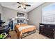 Bedroom featuring a desk, and dresser for storage at 12264 Olive Way, Thornton, CO 80602