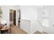 Upstairs hallway with carpeted floors and plenty of natural light at 12264 Olive Way, Thornton, CO 80602