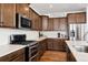 Well-equipped kitchen with modern appliances and ample counter space at 12264 Olive Way, Thornton, CO 80602