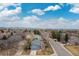 A suburban neighborhood featuring well-maintained homes with easy access to schools and parks at 1898 Wilson Cir, Erie, CO 80516