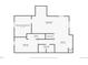 Basement floor plan showing unfinished utility room, living room, bedroom, and kitchen at 1898 Wilson Cir, Erie, CO 80516