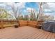 A spacious wooden deck with built-in seating, perfect for entertaining and enjoying outdoor living at 1898 Wilson Cir, Erie, CO 80516