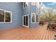 A wooden deck, accessed by sliding glass doors, offers outdoor relaxation at 1898 Wilson Cir, Erie, CO 80516